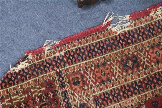 A Shiraz rug, a Bokhara saddlecloth and another rug (wear)